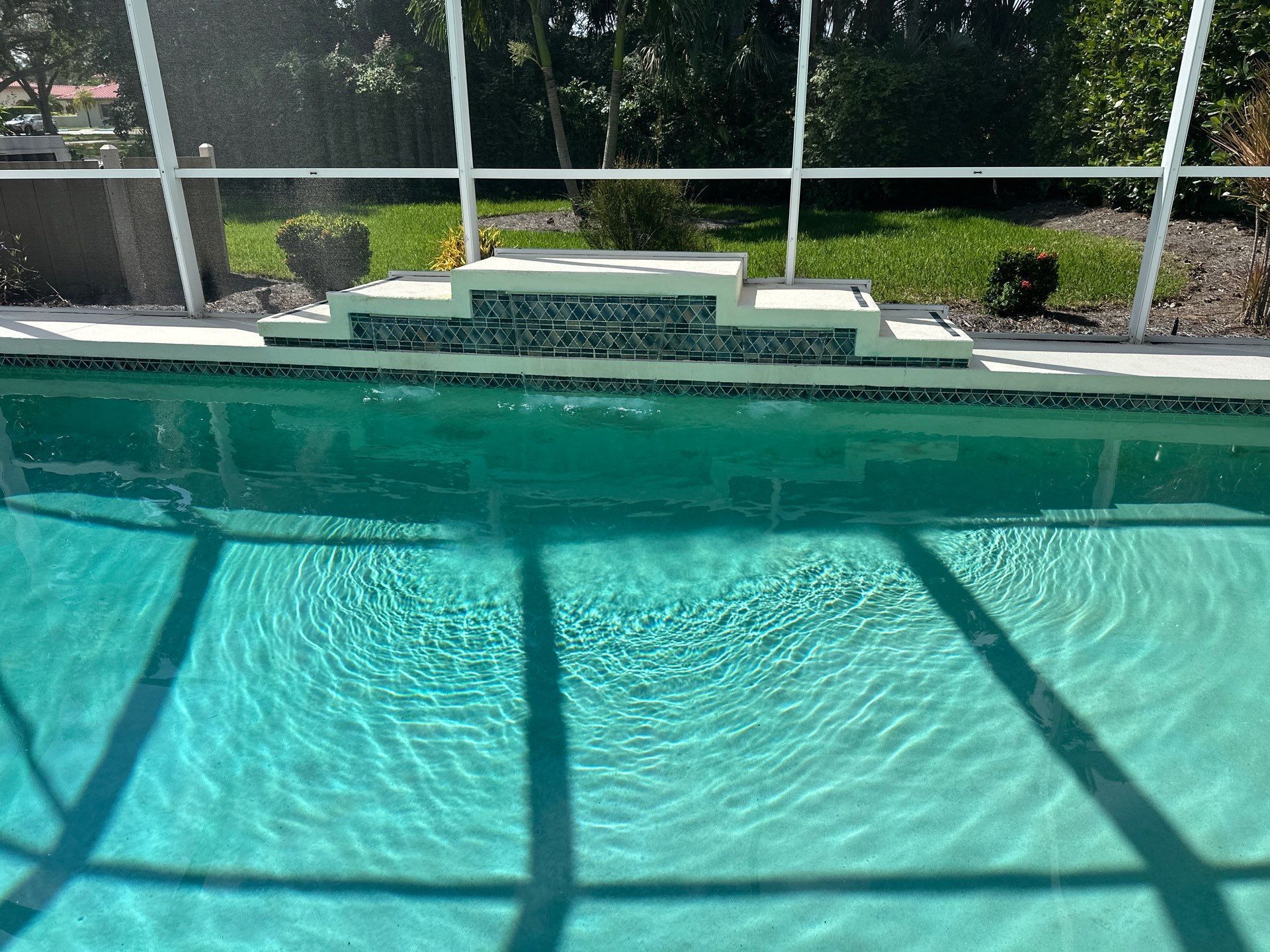 Before and after pool resurfacing in Venice FL by Nelson Pool Company — before