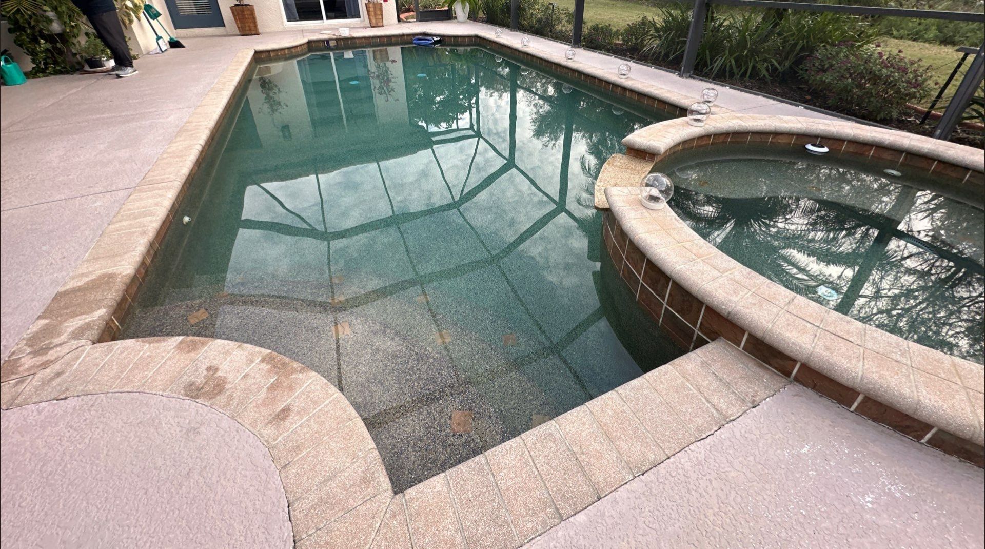 Before and after pool resurfacing in Bradenton FL with Wet Edge Brilliant Blue, NPT Borghini, Luv Tile, and Crema Bella Marble pavers by Nelson Pool Company — before