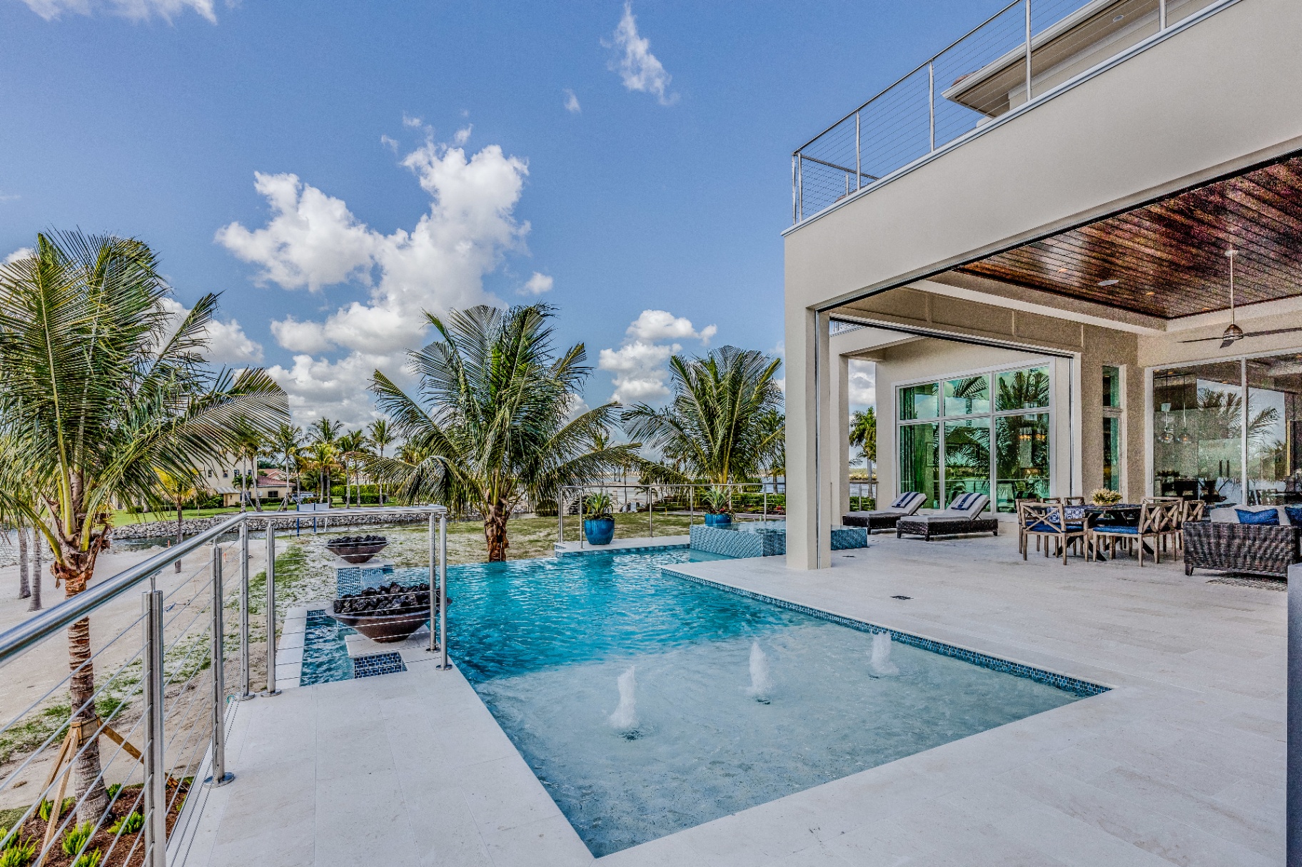 Luxury finished pool and outdoor living space built by Nelson Pool Company