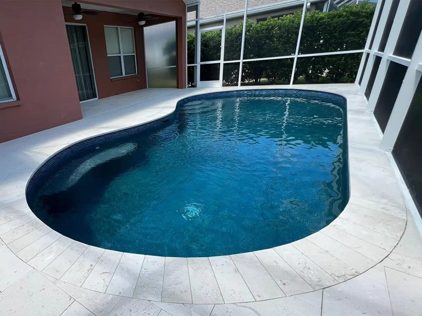 Before and after pool renovation in Sarasota FL by Nelson Pool Company — after