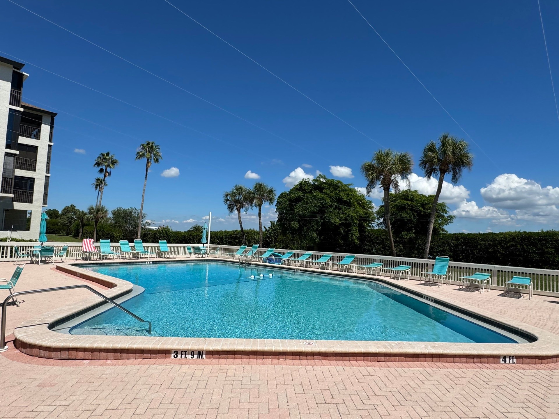 Renovated commercial condo community pool with paver deck by Nelson Pool Company