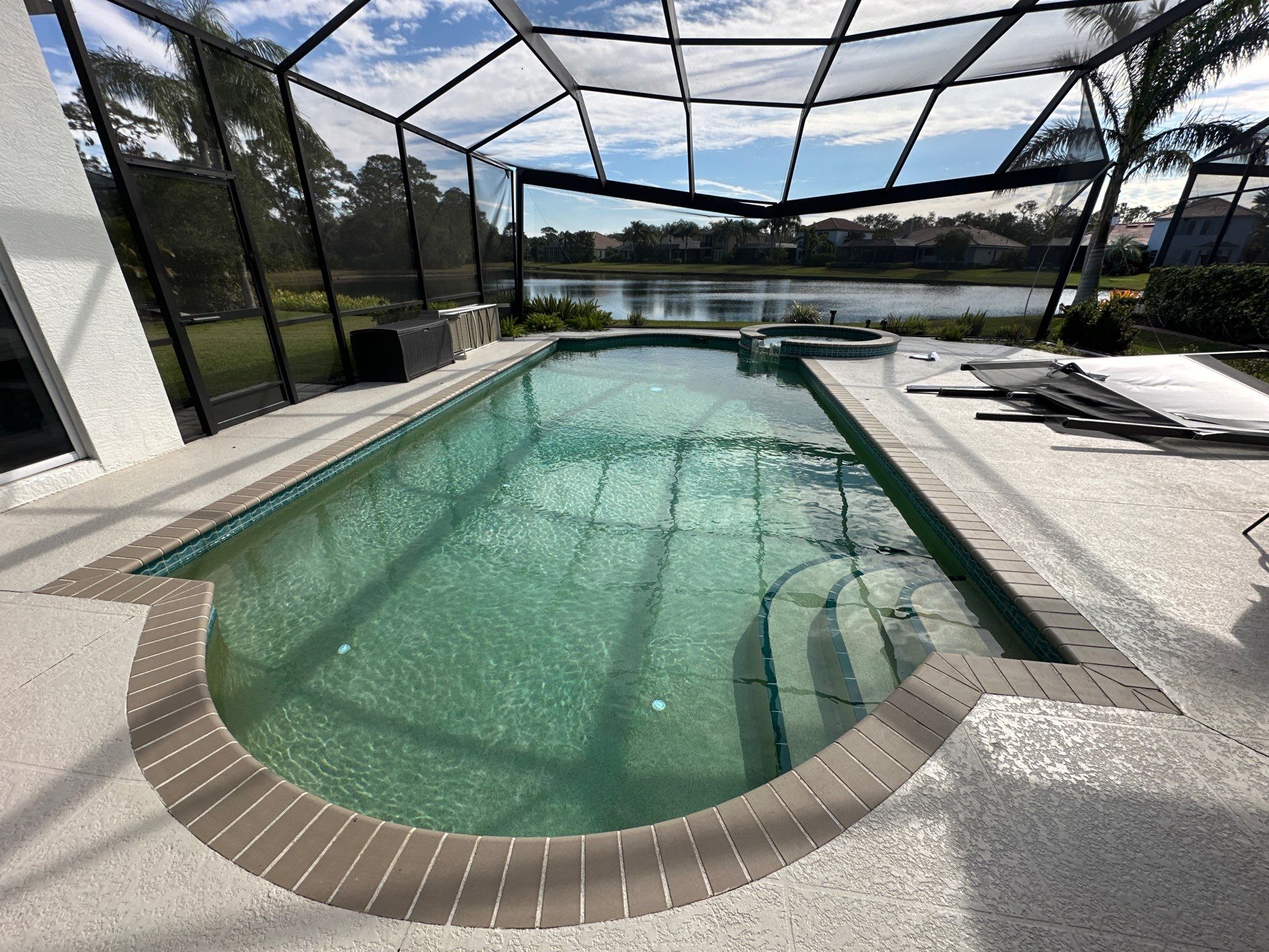 Before and after pool remodel in Bradenton FL with Luv Tile, Marquis PMM Quartz Surface, and Royal Beige Marble pavers by Nelson Pool Company — before