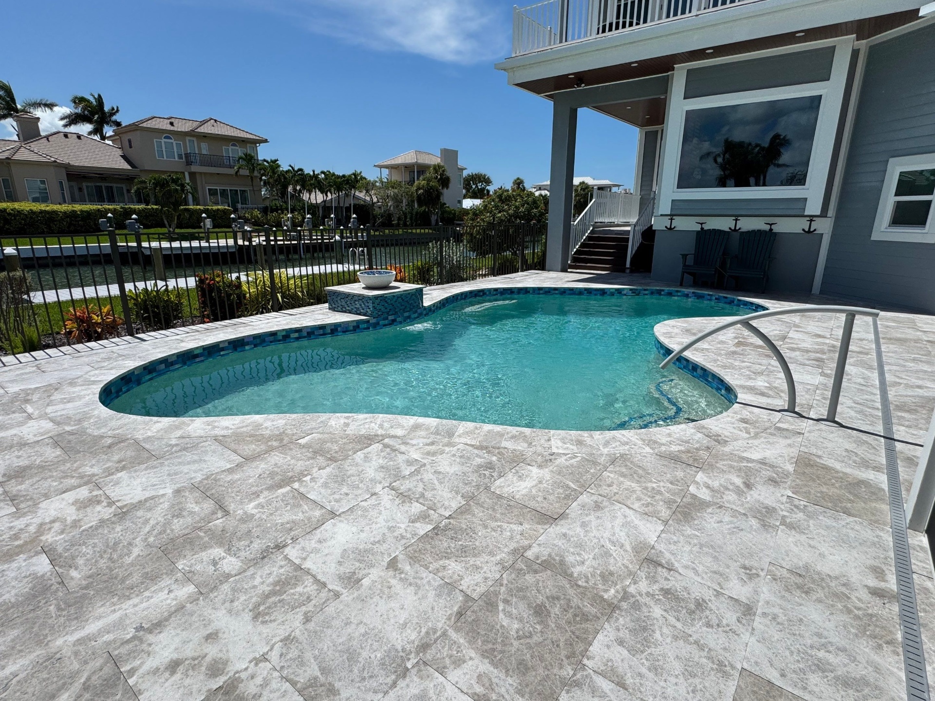 Longboat Key Pool Resurfacing with Travertine Deck Renovation in Longboat Key — Nelson Pool Company