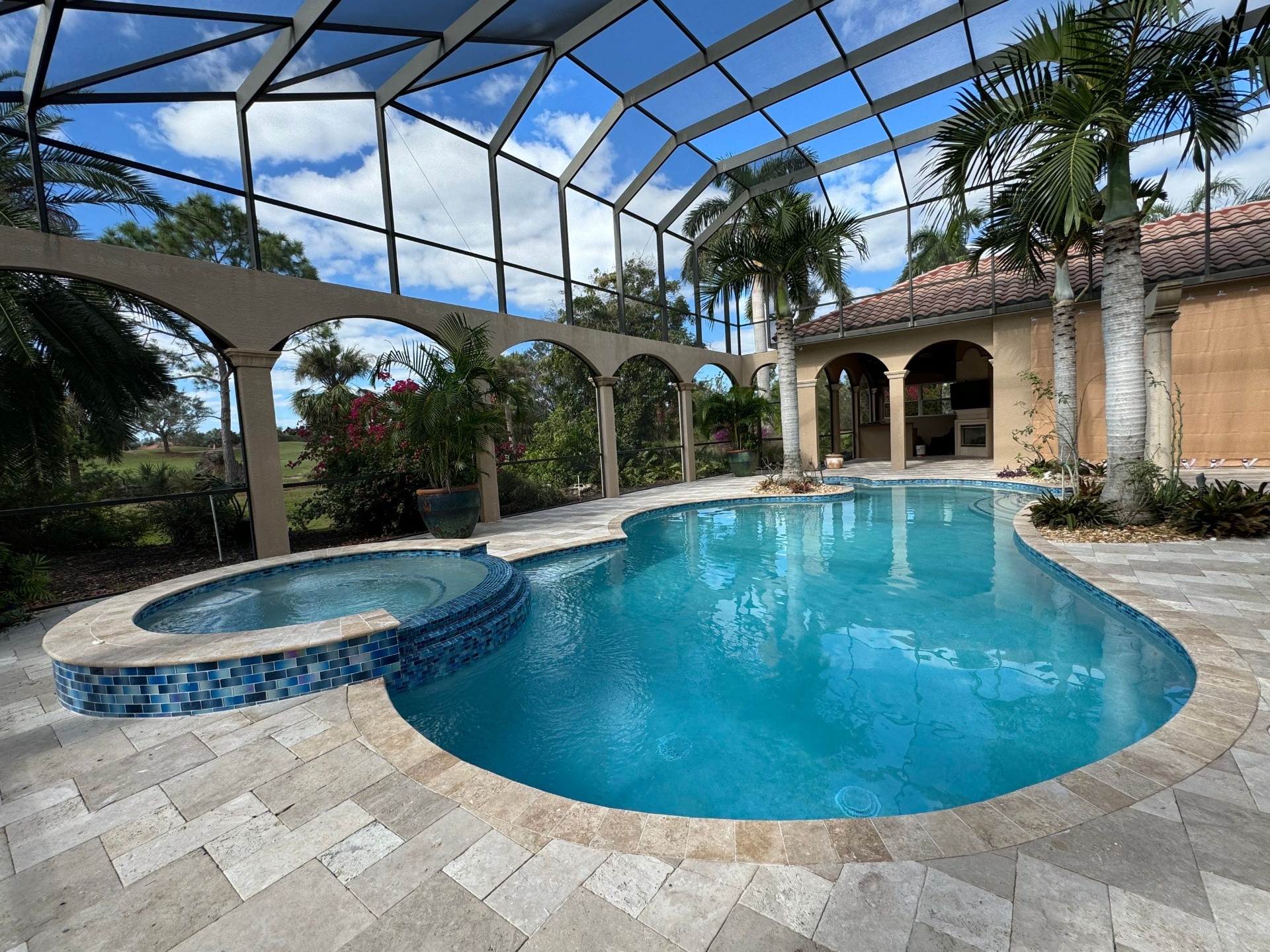 Freeform Pool & Spa Remodel with Travertine Paver Deck in Lakewood Ranch — Nelson Pool Company