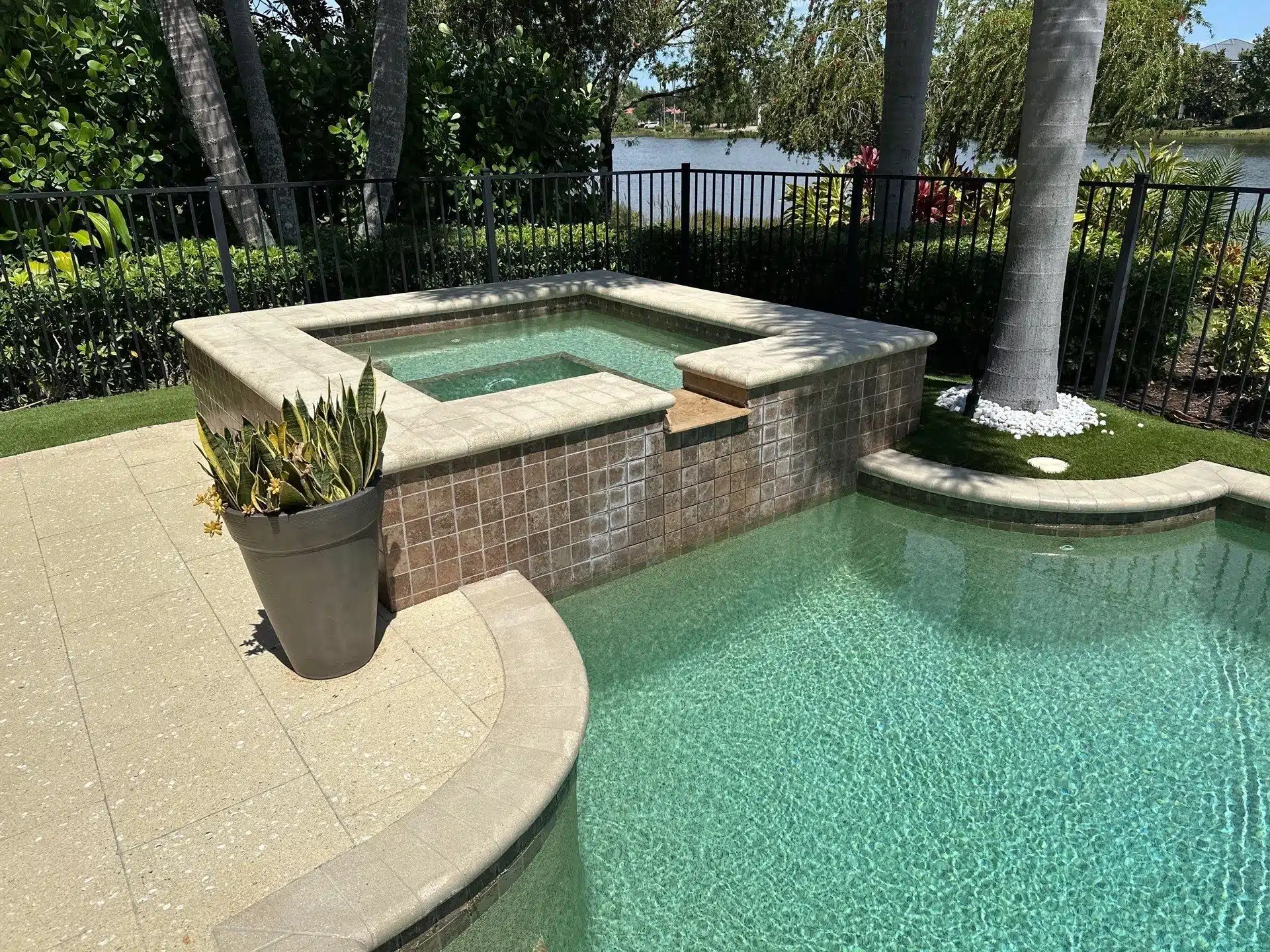 Before and after pool and spa remodel in Lakewood Ranch FL by Nelson Pool Company — before