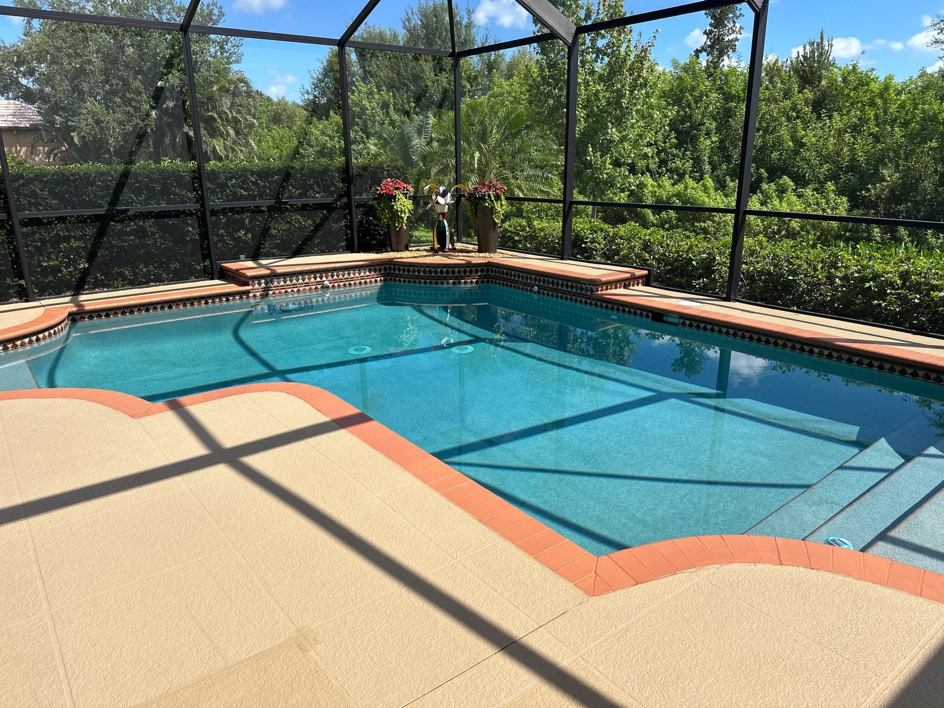 Before and after pool renovation in Parrish FL with Luv Tile, Pebble Crystal Buff Blue, and Mocha Plus Travertine by Nelson Pool Company — before