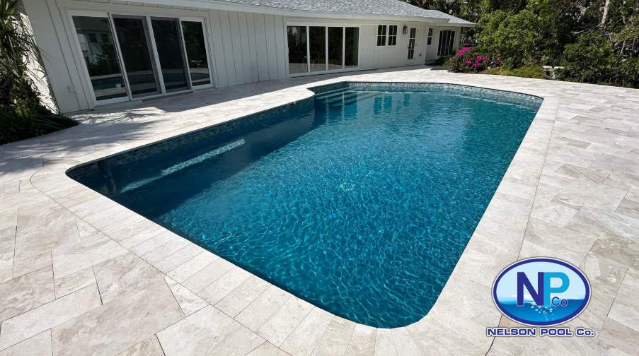Pool Renovation with Travertine Paver Deck in Holmes Beach — Nelson Pool Company