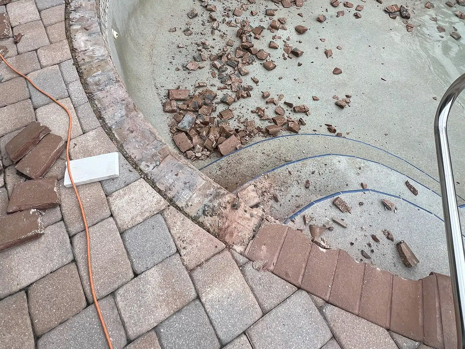 Before and after pool renovation with new tile and coping in Sarasota FL — before