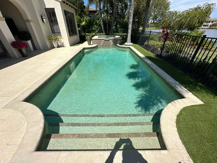 Before and after complete backyard pool remodel in Lakewood Ranch FL — before