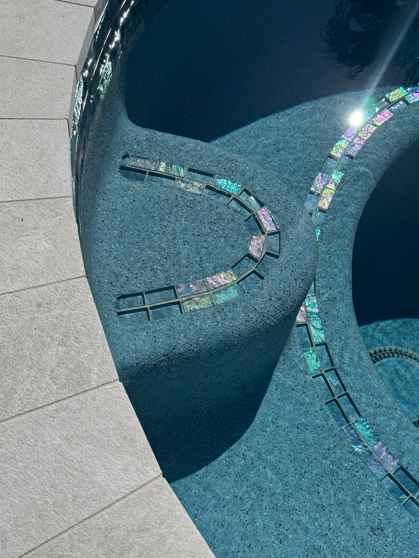 Pool Resurfacing with Iridescent Glass Tile Detail in Holmes Beach — Nelson Pool Company