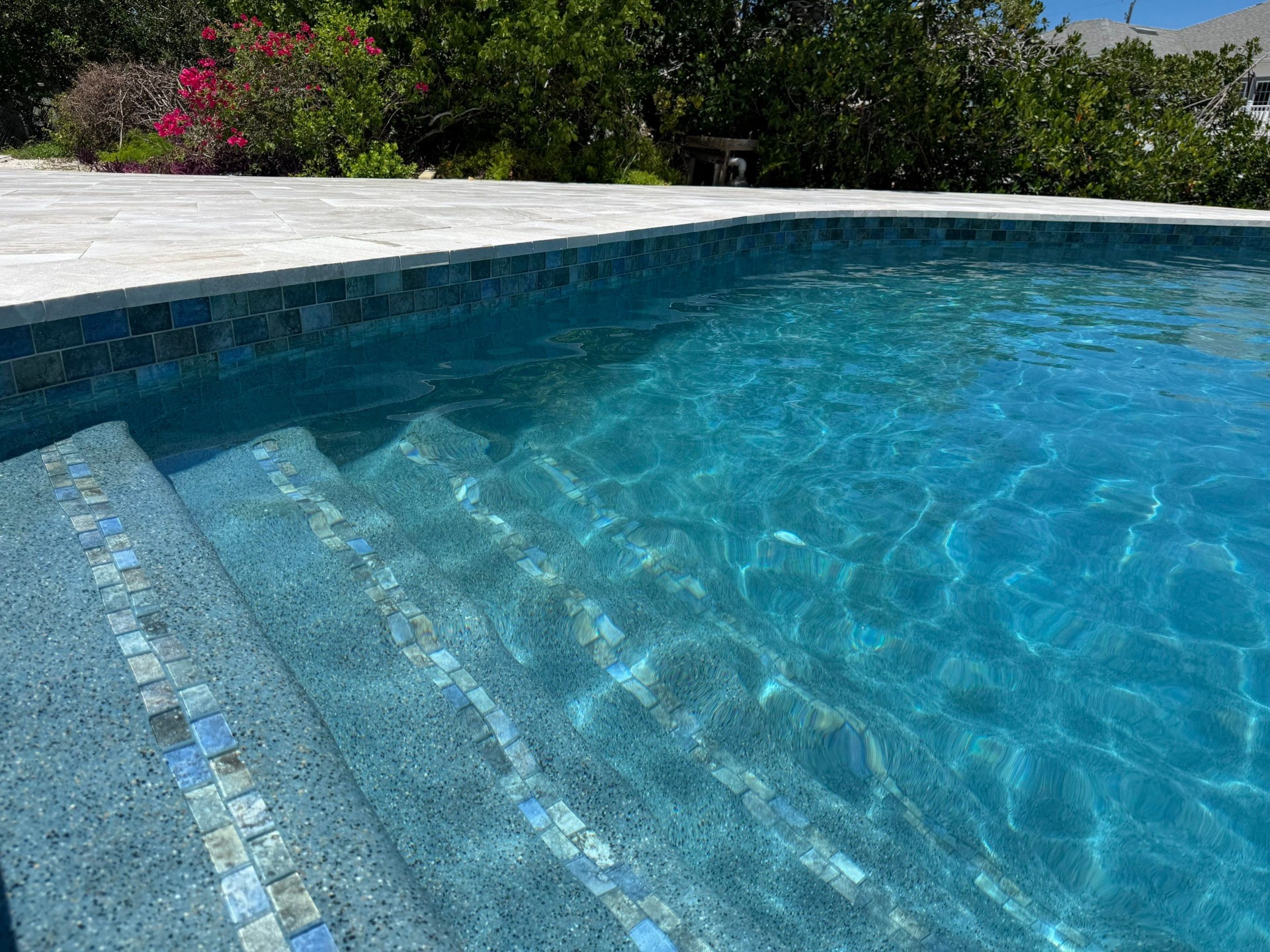 Pool Resurfacing with Glass Tile Steps & Waterline in Holmes Beach — Nelson Pool Company
