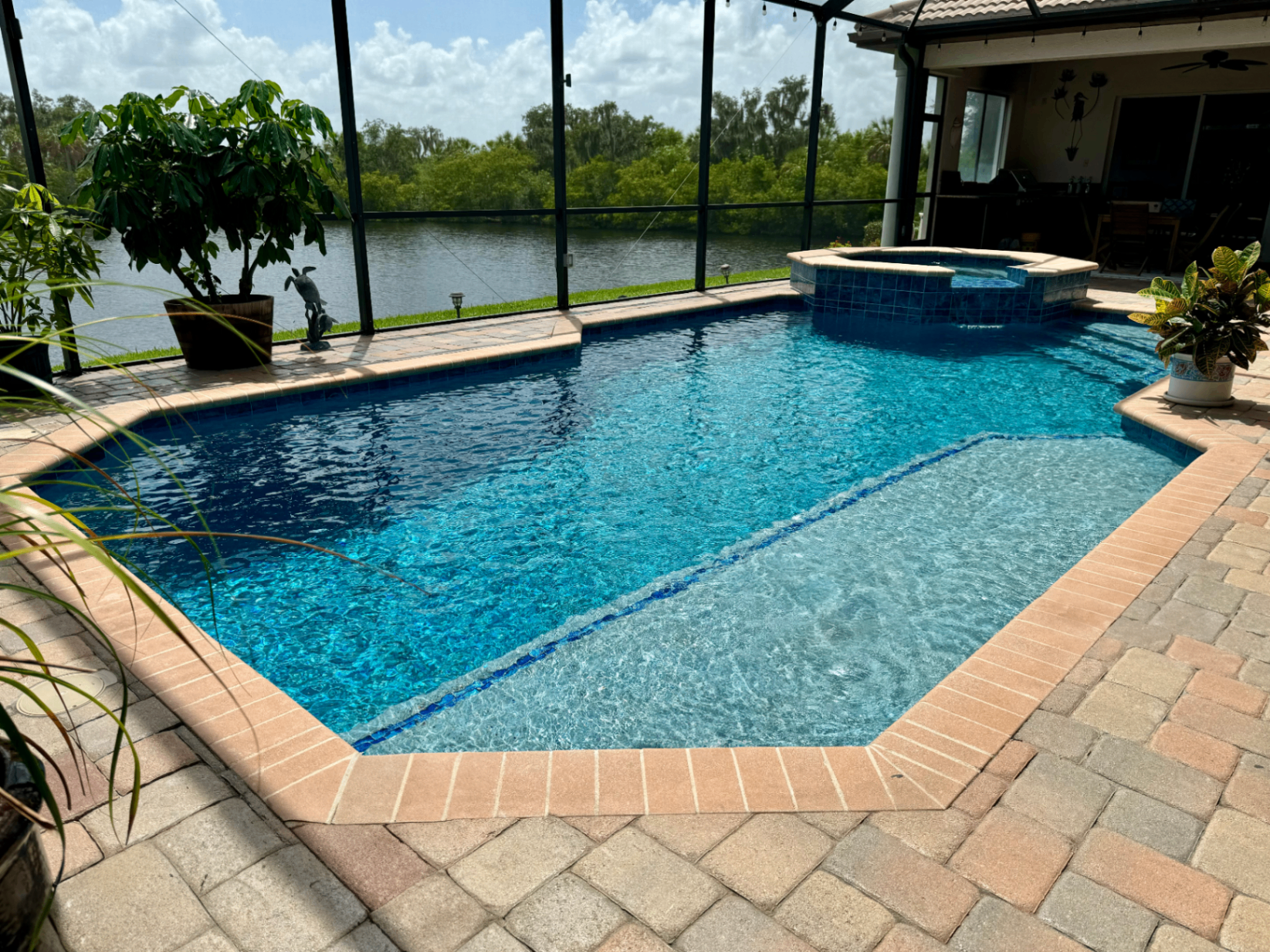 Pool Renovation with Spa & Paver Deck Overlooking the Water in Ellenton — Nelson Pool Company