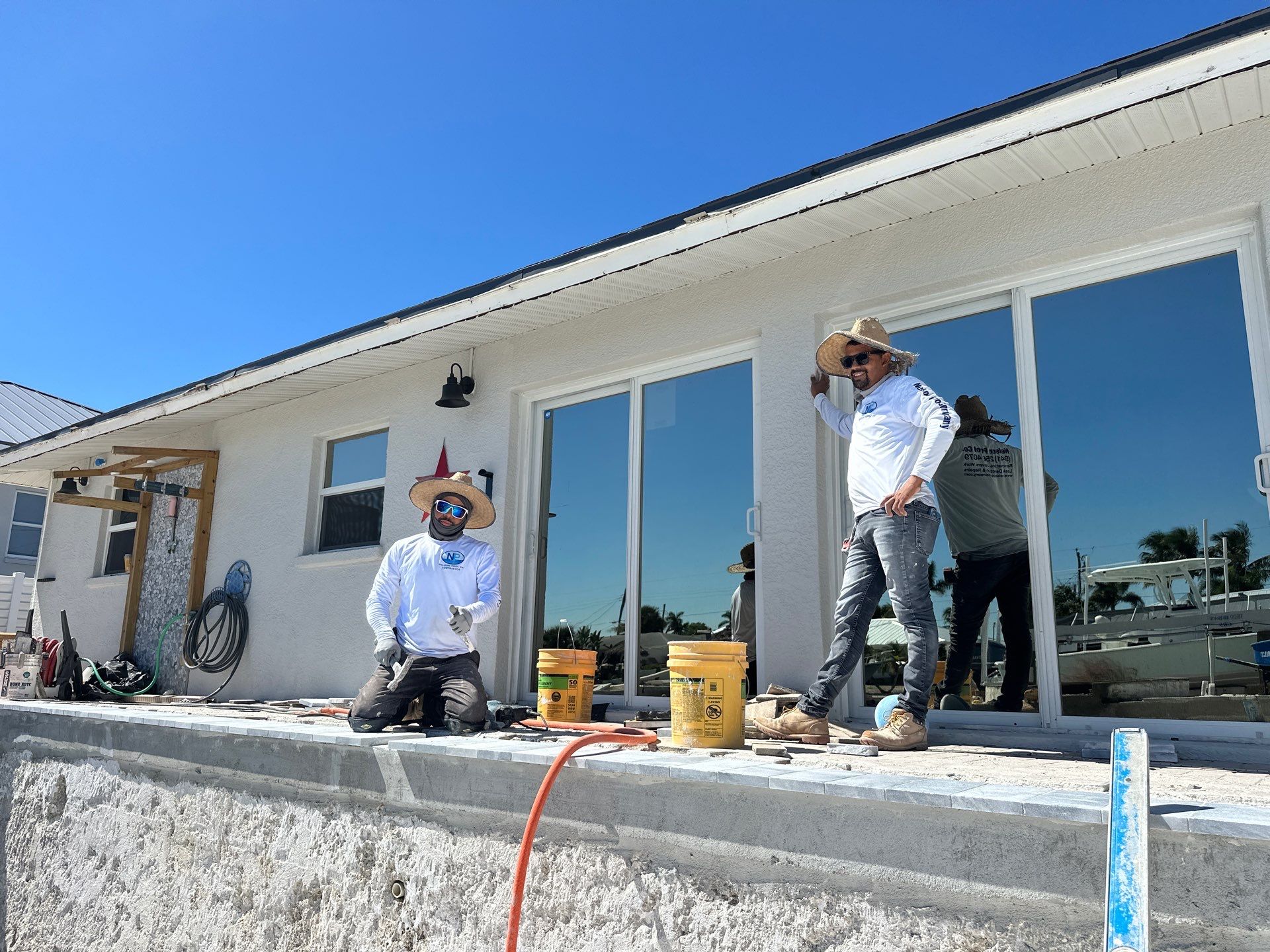 Nelson Pool Company crew servicing pool equipment in Southwest Florida
